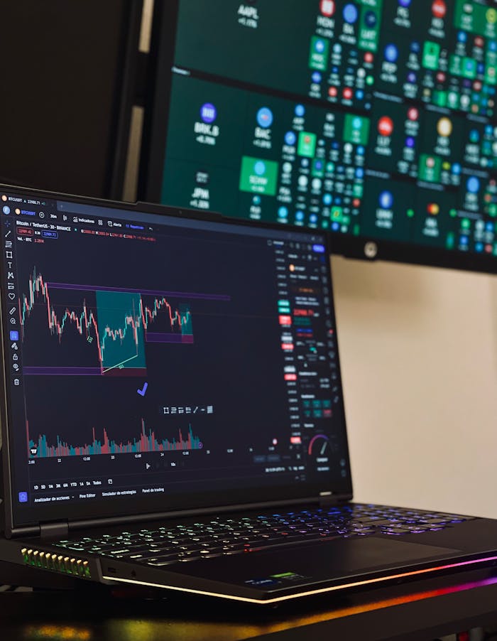 A Laptop Displaying a Stock Market Chart